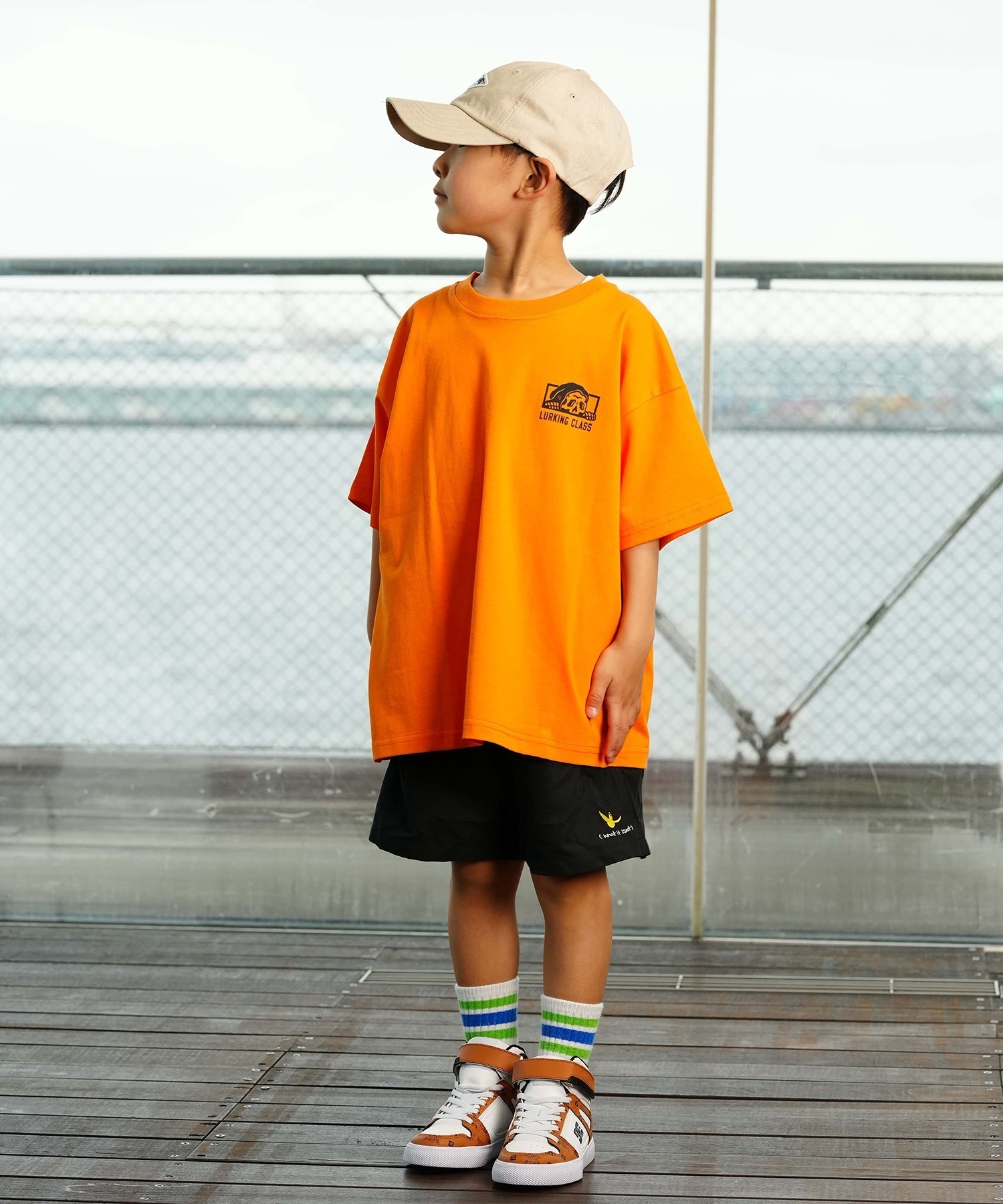 【ムラサキスポーツ限定】 LURKING CLASS ラーキングクラス PATTERN LOGO CHECKER TEE キッズ 半袖 Tシャツ ST24STM04K(WHITE-130cm)