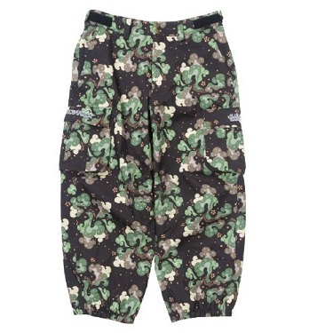 Camouflage cargo pants in black, green, and beige with multiple pockets and elastic cuffs at the ankles
