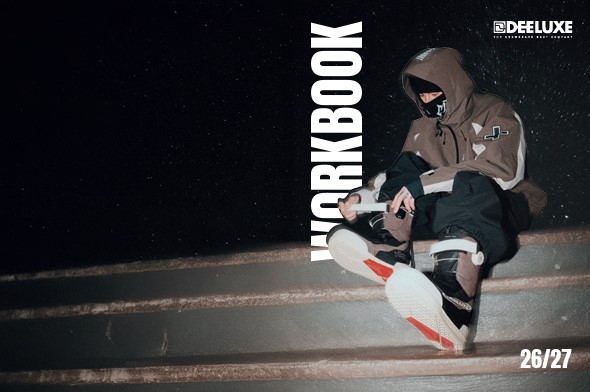 Skateboarder in a brown hoodie sits on concrete steps at night, with bold vertical 'WORKBOOK' text and 26/27 in the corner.