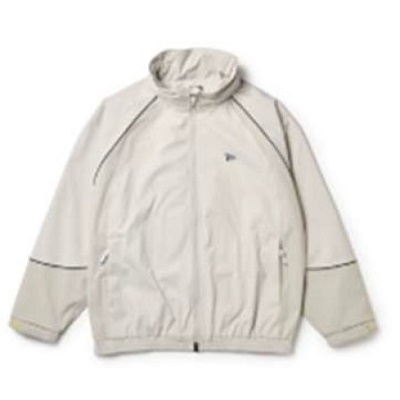 Cream-colored lightweight windbreaker jacket with a high collar, zippered pockets, and elastic cuffs.