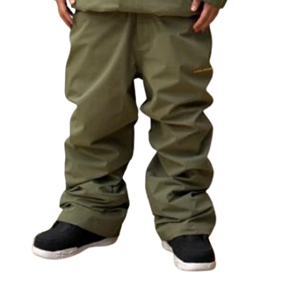 Front view of a person wearing olive-green baggy pants over black sneakers with white soles.