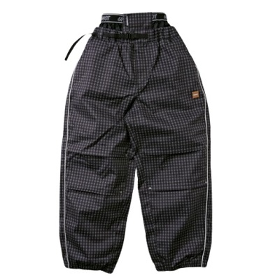 Black geometric-pattern baggy pants with a drawstring waist and elastic cuffs, side stripe detail visible as a fashion/pant product photo.