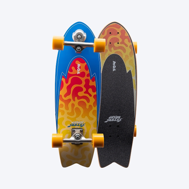 Two colorful skateboards with yellow wheels standing together side by side on a light background