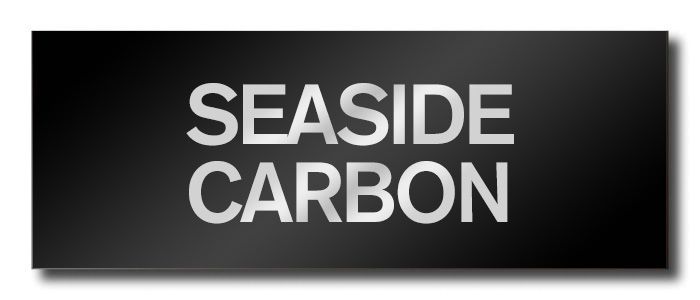 FKVNYxng - SHOP NEWS | ムラサキスポーツオンラインストア 通販 Banner reading 'SEASIDE CARBON' in bold silver lettering on a black gradient background.