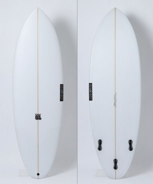 Two white shortboards standing upright on stands, showing tan center stringers and small logos on each board.