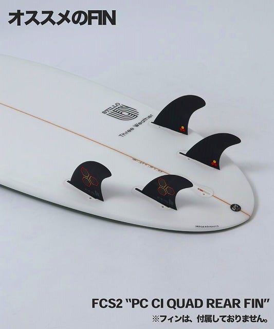 White surfboard with four black FCS2 quad rear fins installed, captioned 'FCS2 "PC CI QUAD REAR FIN"' indicating recommended fins.