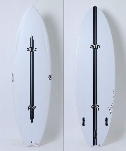 Two white surfboards stand upright side by side, each with a bold black vertical stripe and small brand decals on a plain light background.