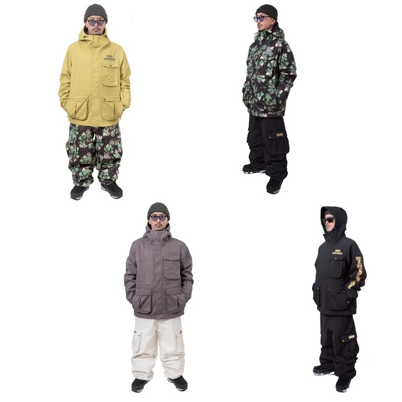 NOMADIC100 - SHOP NEWS | ムラサキスポーツオンラインストア 通販 Group of four men modeling heavy winter jackets in yellow, camouflage, gray, and black on a white background.