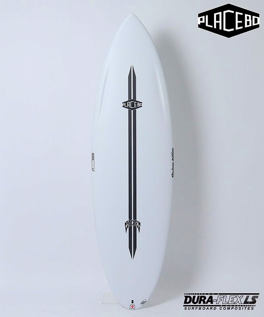 White surfboard with a black vertical stripe and Placebo brand logos, standing upright against a light background.