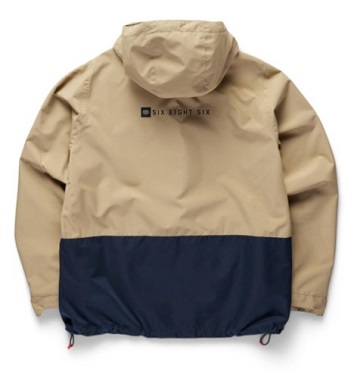 スクリーンショット 2026-05-15 112037 - SHOP NEWS | ムラサキスポーツオンラインストア 通販 Beige and navy color-block windbreaker with hood, back view displaying small 'SIX EIGHT SIX' logo.