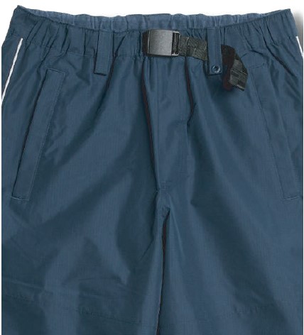 スクリーンショット 2026-05-30 195008 - SHOP NEWS | ムラサキスポーツオンラインストア 通販 Navy blue waterproof pants with an elastic waistband and detachable belt, showing front pockets.