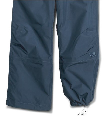 スクリーンショット 2026-05-30 195638 - SHOP NEWS | ムラサキスポーツオンラインストア 通販 Navy blue rain pants with elastic cuffs and a drawstring hem, Vans logo on the right leg.