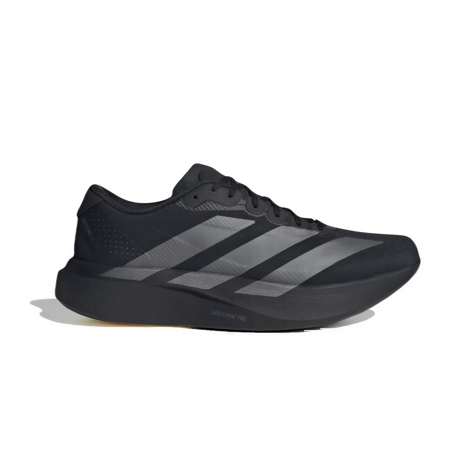 Black running shoe shown from a side angle with three gray stripes on the upper and a thick black sole (Lightstrike Pro).