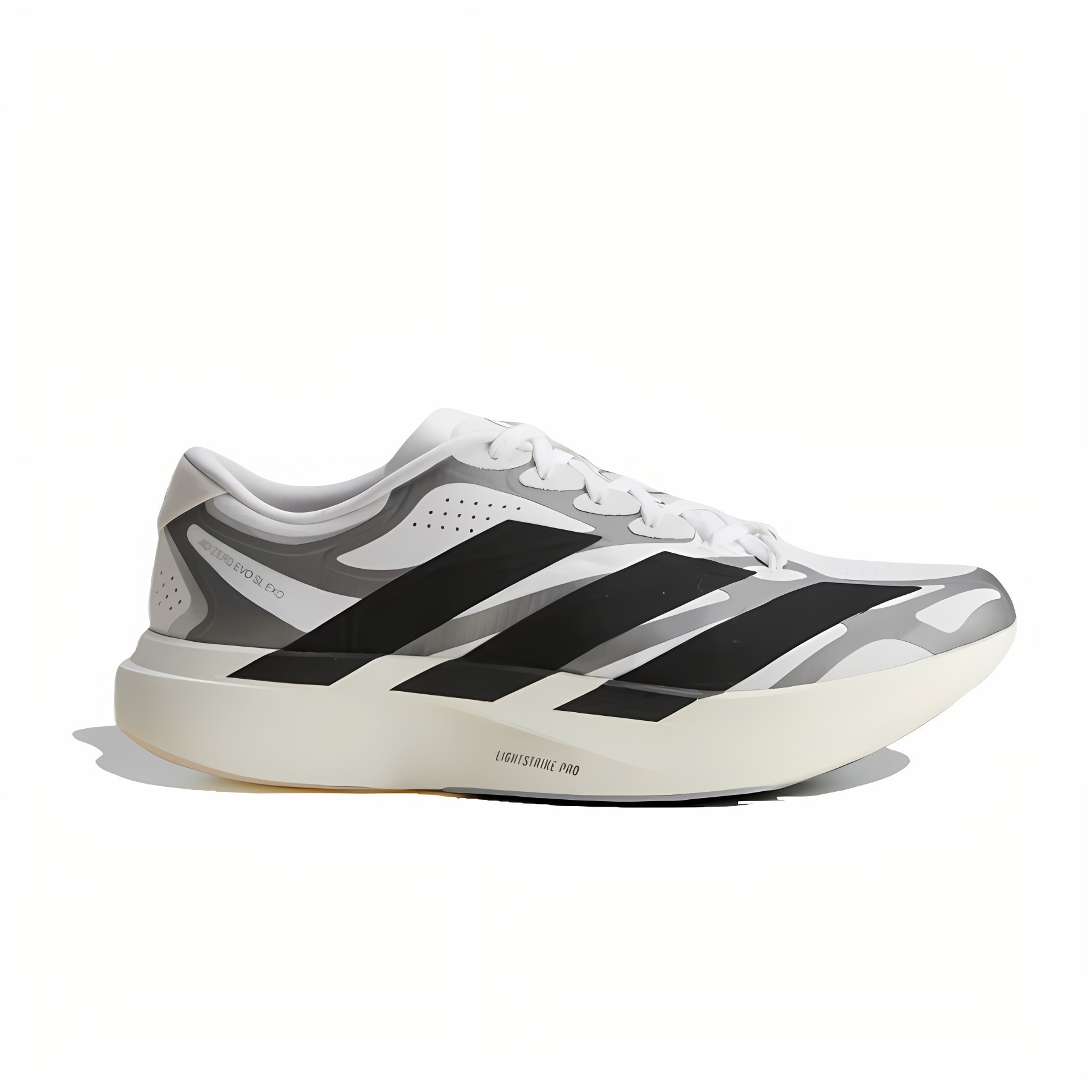 White and gray athletic sneaker shown from the side, with black stripes along the midfoot and a light sole.