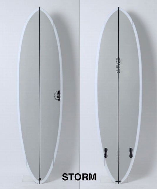 BIG BARON9 - SHOP NEWS | ムラサキスポーツオンラインストア 通販 Two Storm surfboards standing upright side by side against a white background, showing branding at the bottom edge.