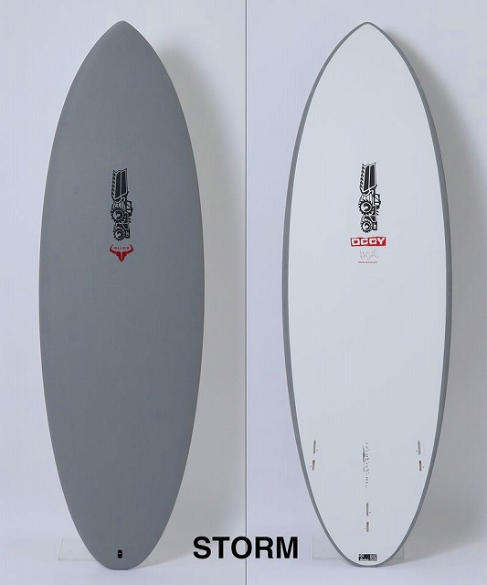 BULL RUN SOFT 3 - SHOP NEWS | ムラサキスポーツオンラインストア 通販 Two surfboards standing upright side by side, one gray with a black logo and red accent, the other white with a matching logo, labeled STORM at the bottom.