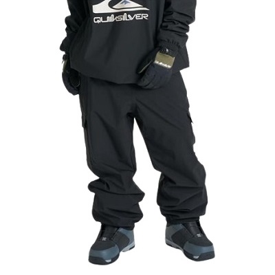 Person wearing black snow pants, gloves, and dark winter boots standing against a white background.