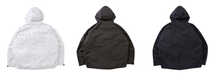 Three hooded rain ponchos displayed side by side in white, brown, and navy (back view).