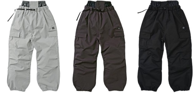 Three cargo pants in light gray, brown, and black with drawstring waists and flap pockets side by side.