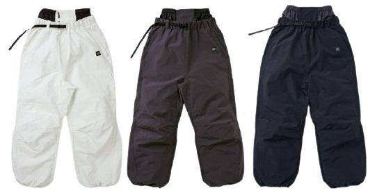 Three pairs of baggy snow pants in white, brown, and navy with drawstring waists and elastic cuffs.