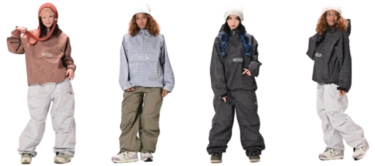 Four children model baggy winter snowsuits in pink, tan, navy, and gray with beanies.